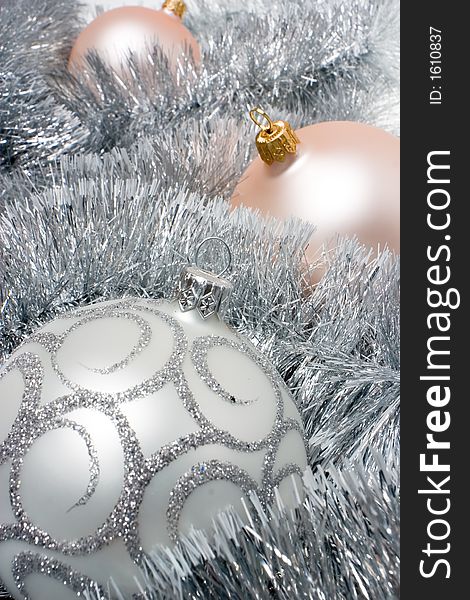 Christmas decoration on silver tinsel background
