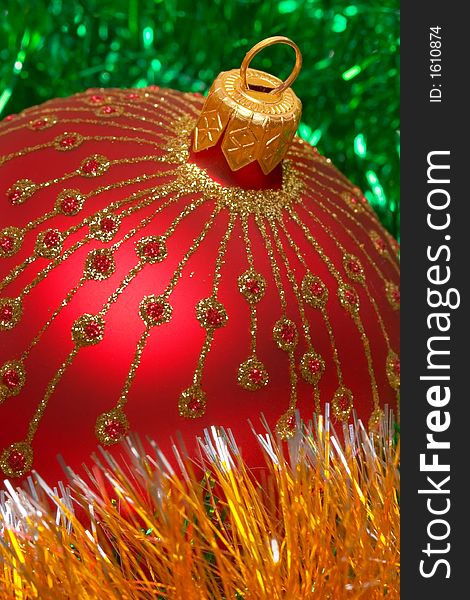 Christmas decoration on silver tinsel background