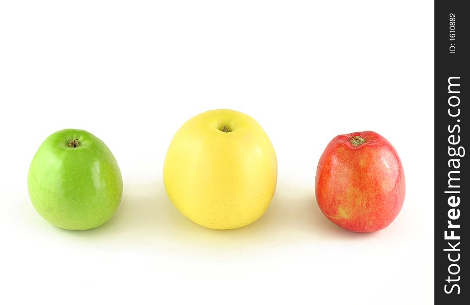 Red yellow and green apple isolated on white