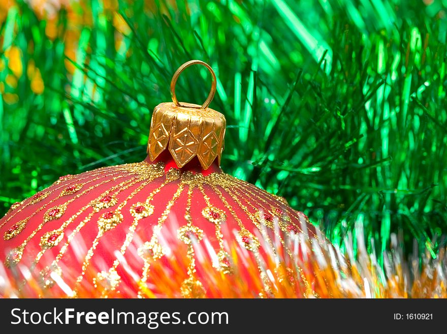 Christmas decoration on color tinsel background