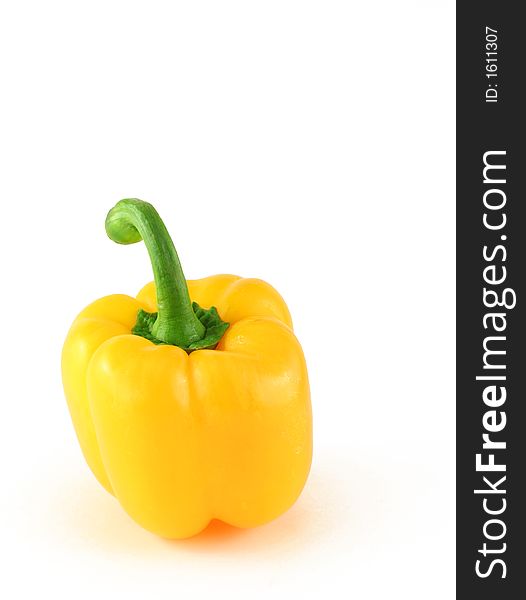 Yellow bell pepper isolated on white