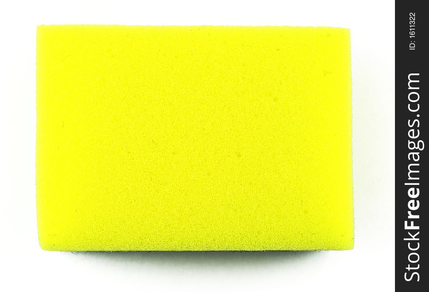 Yellow sponge isolated on white, great for textures and backgrounds