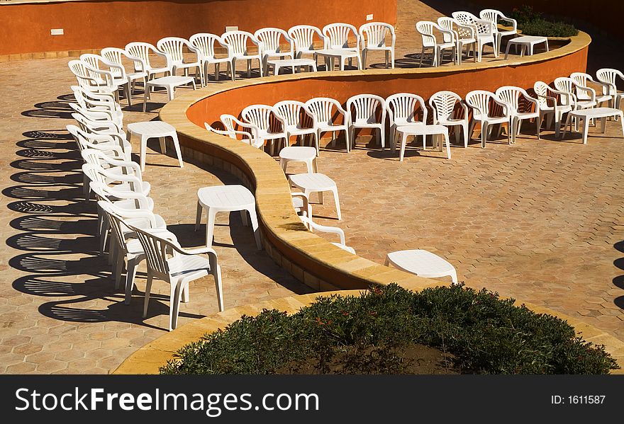 Plastic chairs in the amphitheatre before beginning show