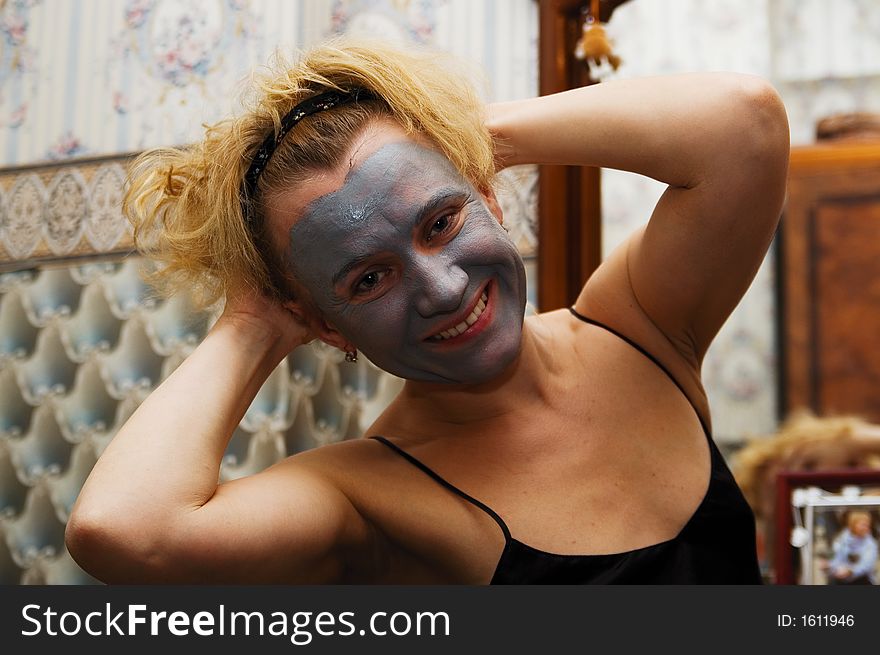 Funny woman with the cosmetic mask. Funny woman with the cosmetic mask