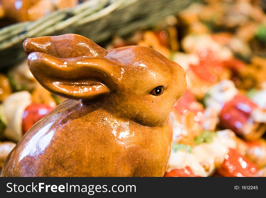 A decorative easter rabbit in ceramics with background