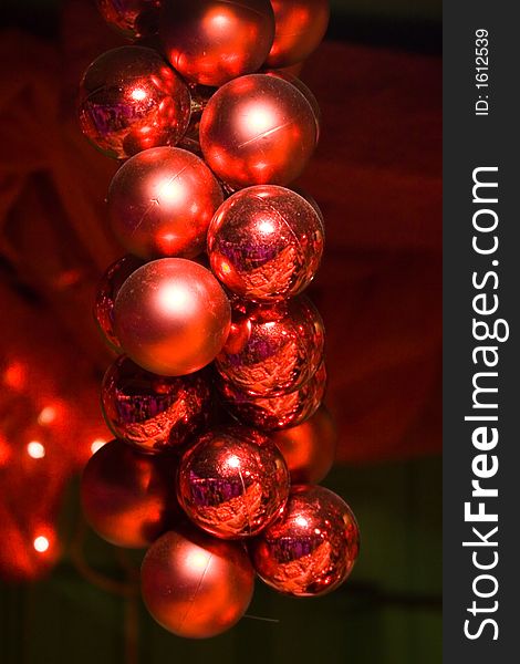 A bunch of red christmas balls hanged