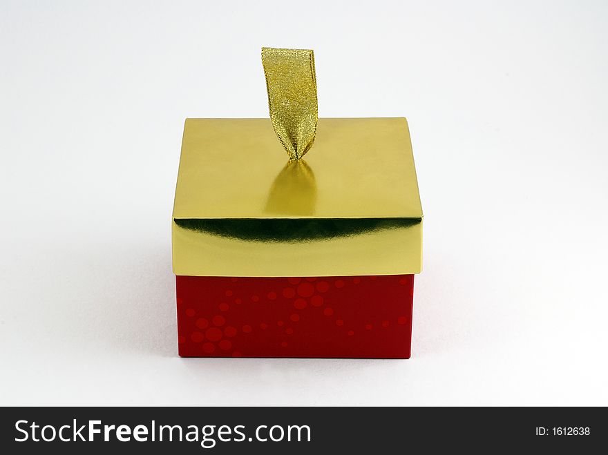 Red and gold closed gift box. Red and gold closed gift box