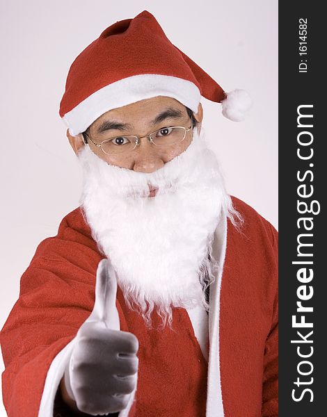 Asian Santa Claus With Thumbs Up