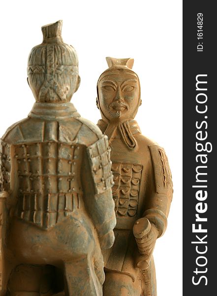 Two terra cotta chinese warriors facing each other. Two terra cotta chinese warriors facing each other