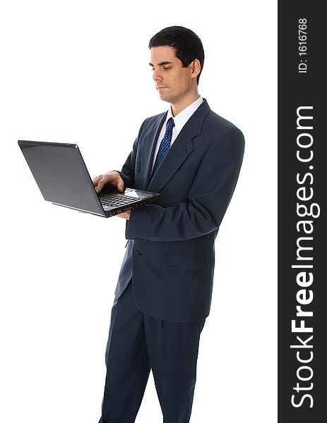 Man in blue suit on white background with laptop. Man in blue suit on white background with laptop