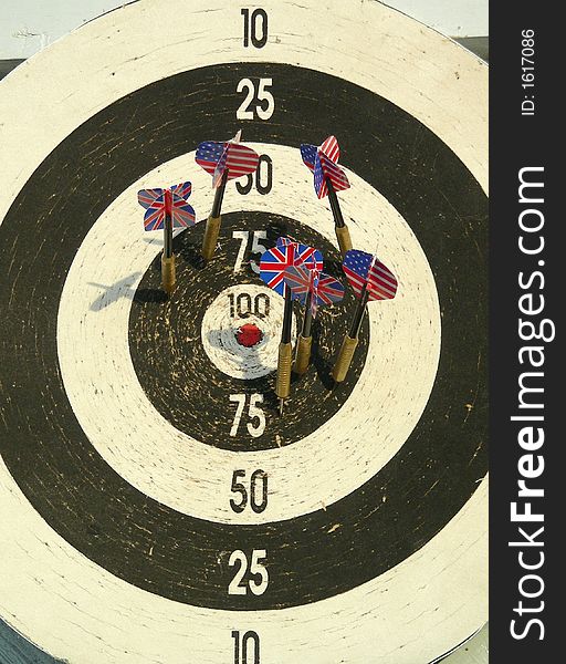 Old dartboard with arrows like flags. Old dartboard with arrows like flags