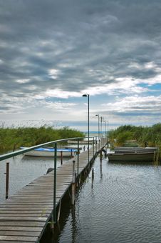 Wooden Jetty In Storm Stock Images