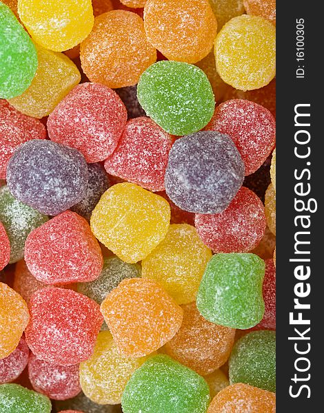 Coloful candy with sugar around it. Great for backgrounds. Coloful candy with sugar around it. Great for backgrounds.