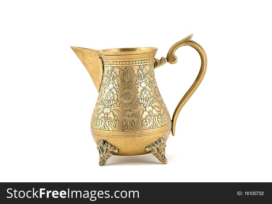 Ancient bronze jug, isolated on white background