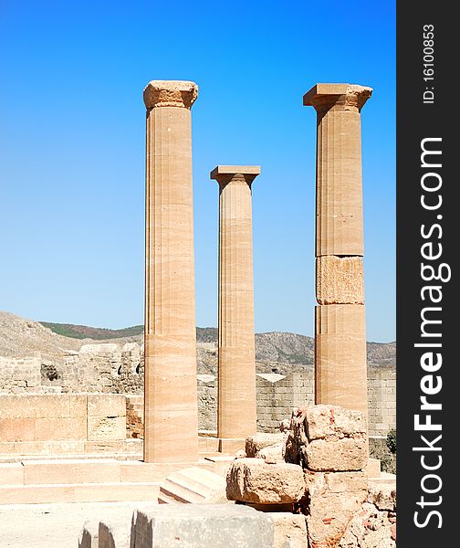 Ancient columns of Acropolis in Rhodes. Lindos city. Greece