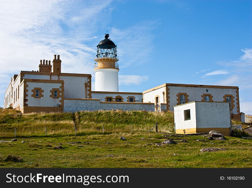 Lighthouse in Sutherland, Scotland, close to cliffs