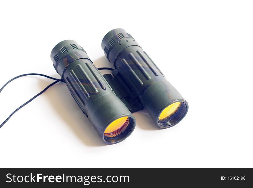 Close-up view of binoculars isolated on a white background