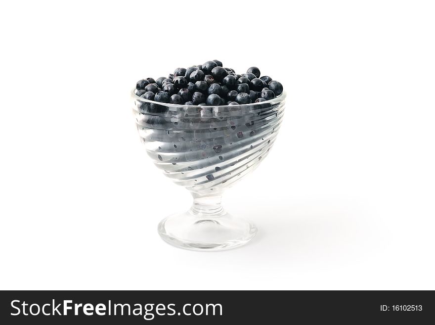 Blueberries in the bowl isolated on white background