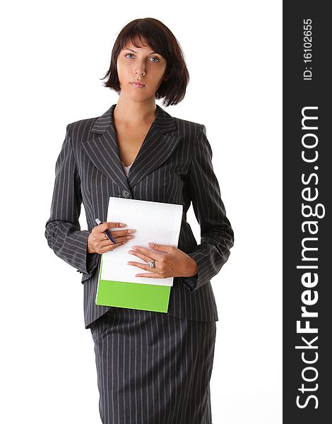Beautiful woman in suit with notepad and pen