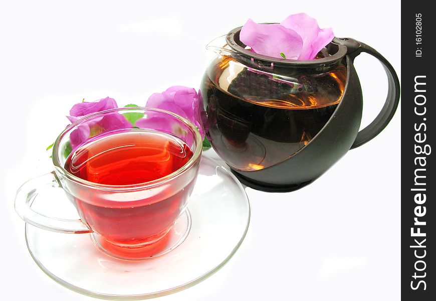 Red tea with wild rose flowers