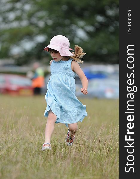 Girl Running in a field
