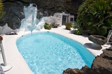 Swimming Pool In Natural Volcanic Rock Area Stock Photos