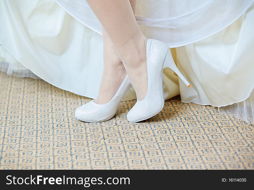 Closeup photo of beautiful bride's shoes