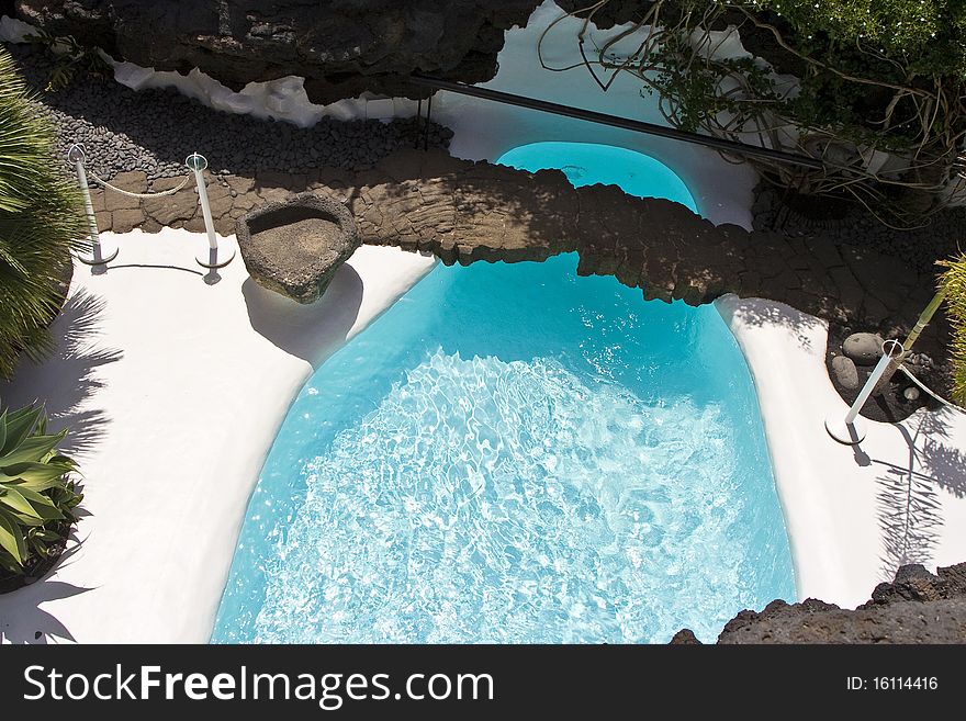 Swimming pool in natural volcanic rock area, Lanzarote,Spain