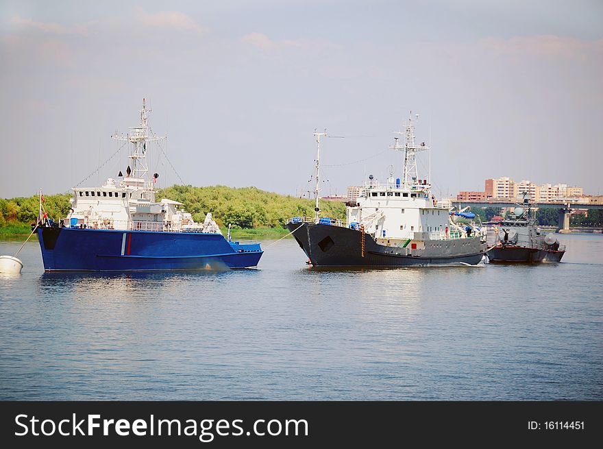 Row Of Warships On A River