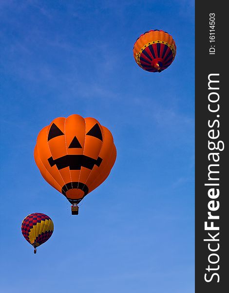 3 Colorful balloons in blue sky