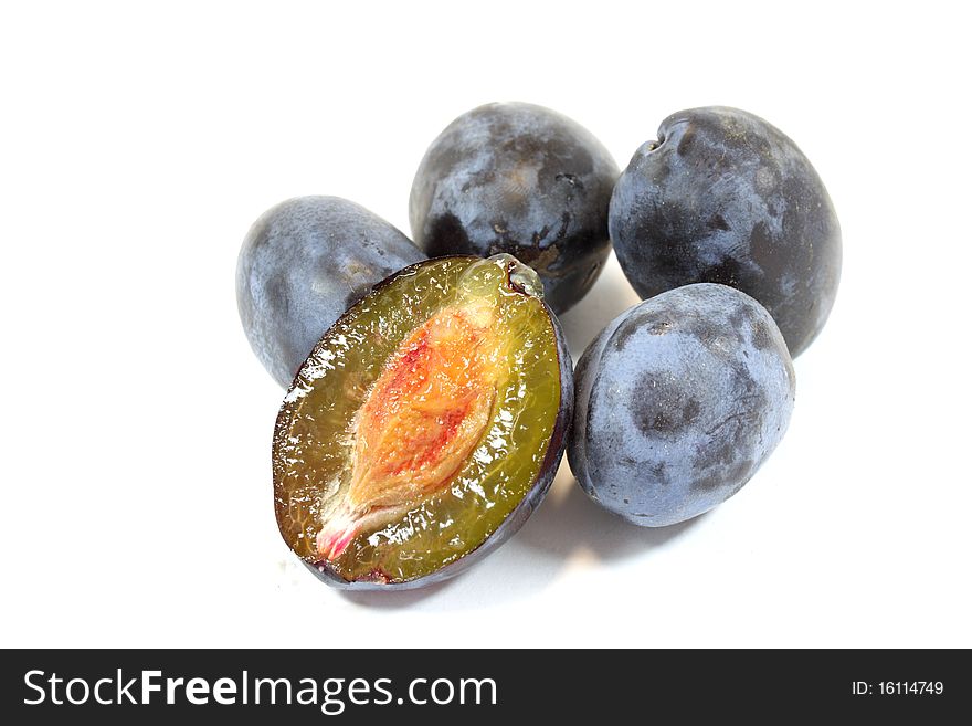 Plums on a white background