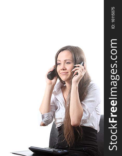 Businesswoman speak by two phones and smile