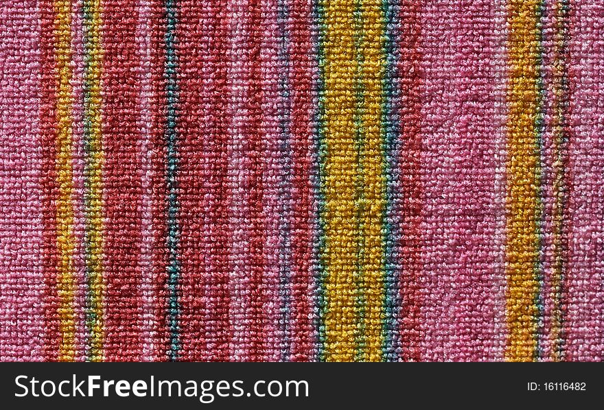 Pretty striped beach towel useful as a background pattern. Pretty striped beach towel useful as a background pattern.