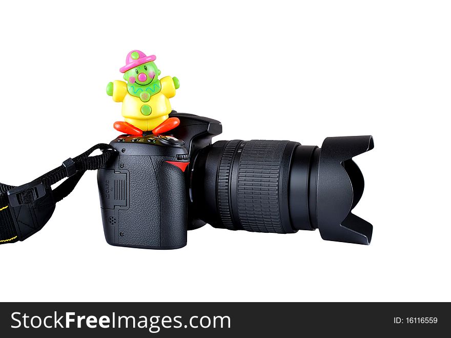 Image of digital camera with a toy