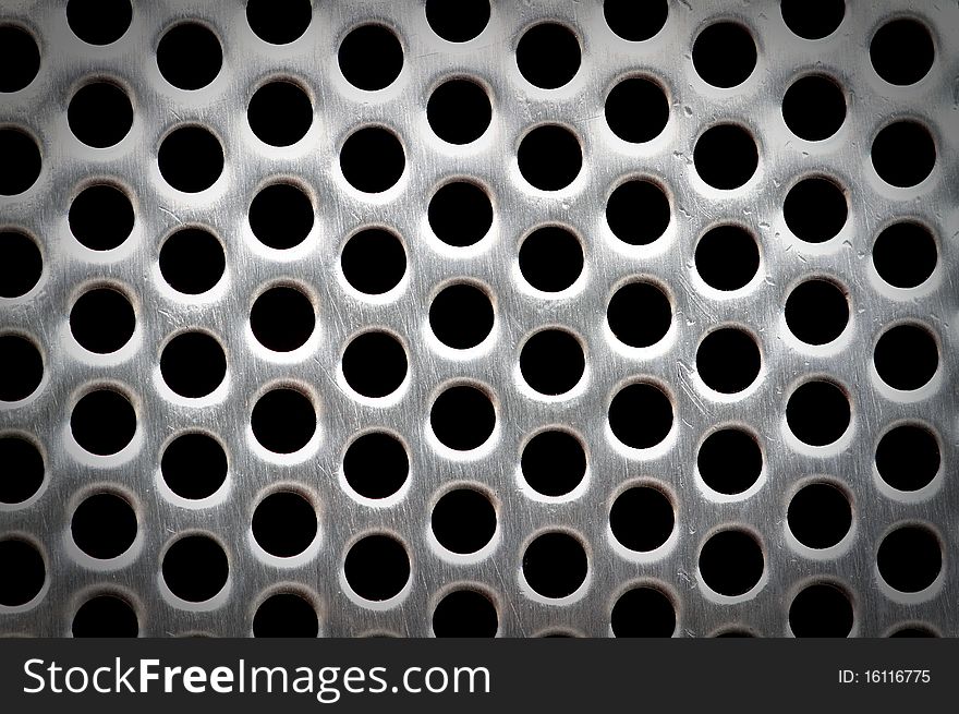 Lattice of white metal with a black background. Lattice of white metal with a black background.