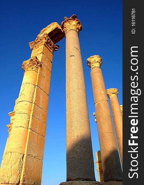 Scenery of the famous site of Palmyra in Syria.Ancient Roman time town in Palmyra (Tadmor), Syria. Greco-Roman & Persian Period. Columns. Scenery of the famous site of Palmyra in Syria.Ancient Roman time town in Palmyra (Tadmor), Syria. Greco-Roman & Persian Period. Columns.