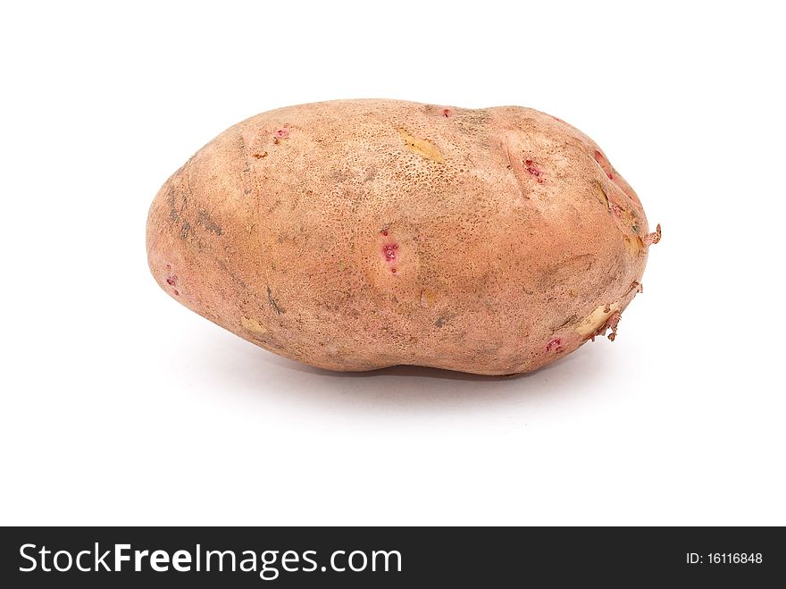 Pink potato isolated on white