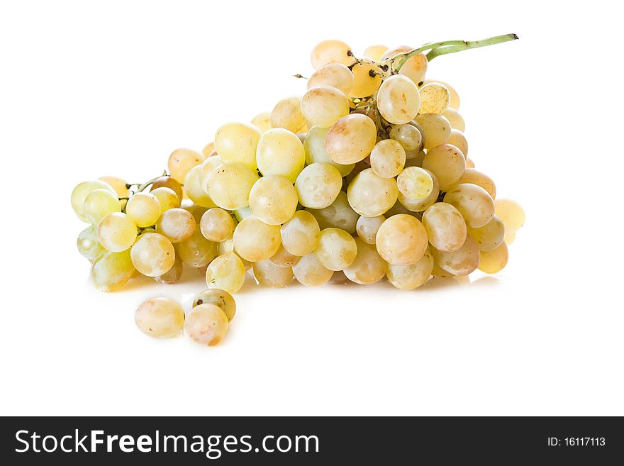 Fresh cut bunch of grapes isolated on white