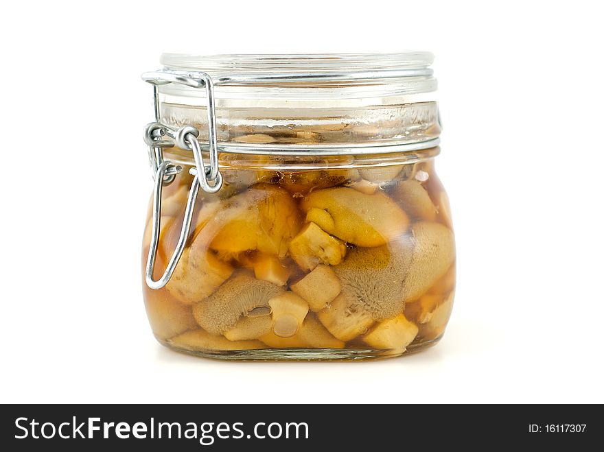 Studio shot of Tinned field mushrooms on white background