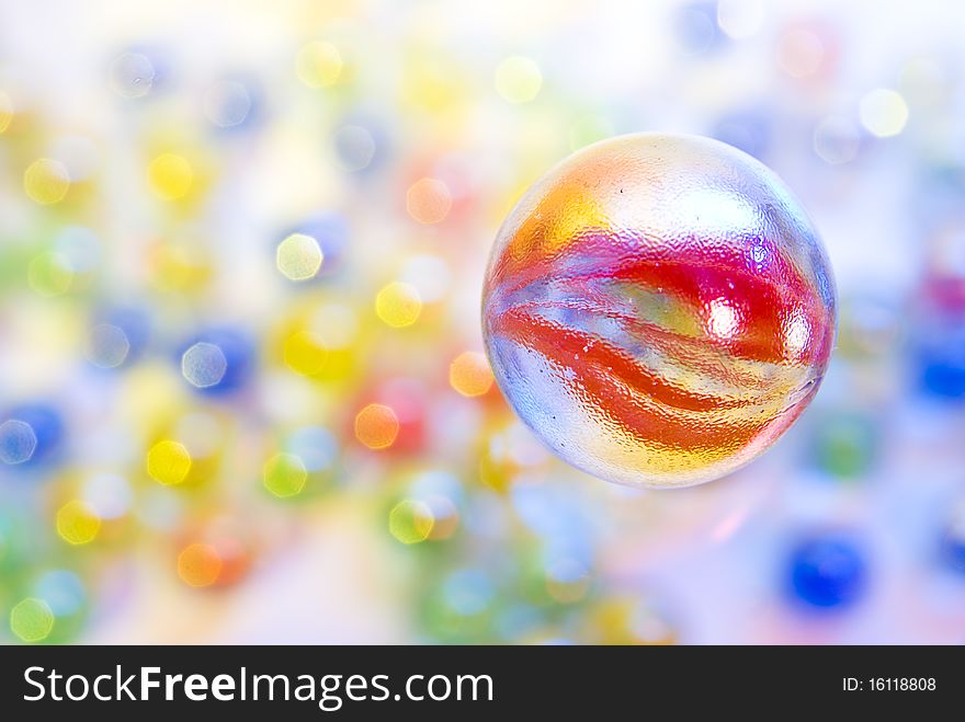 Shots of glass balls with blurred background. Shots of glass balls with blurred background