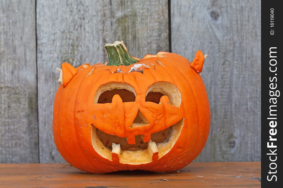 Halloween pumpkin on the bench