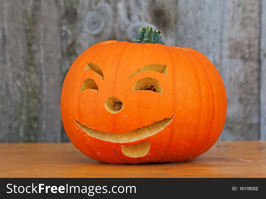 Halloween pumpkin on the bench