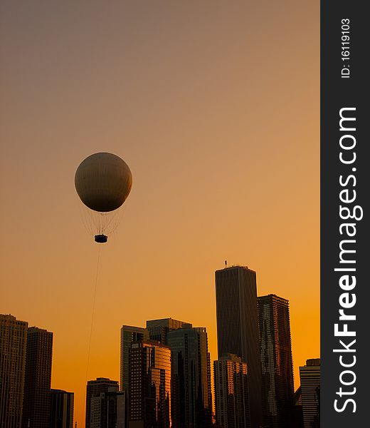 Chicago Skyline at sunset with its typical air balloon