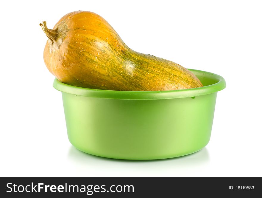 Ripe squash in the container isolated on a white background