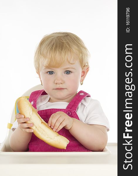 Infant with food, on white background. Infant with food, on white background.