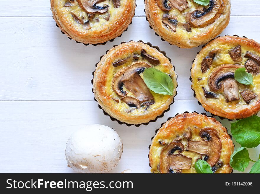 Tartlets With Mushrooms And Chicken On A Wooden Background. View From Above