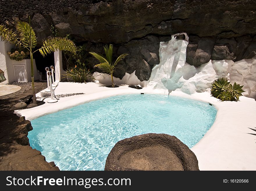 Swimming pool in natural volcanic rock area, Lanzarote,Spain. Swimming pool in natural volcanic rock area, Lanzarote,Spain