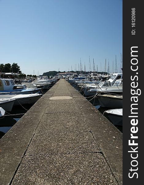 STONE pier for boats and yachts, Croatia; Porec