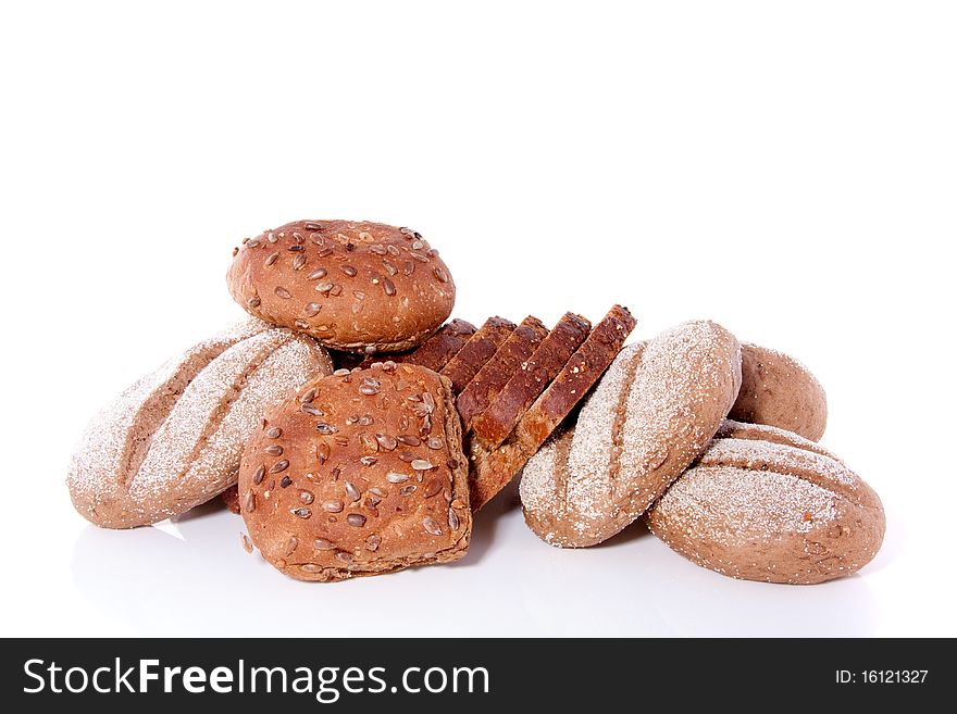 Different types of healthy brown bread isolated over white. Different types of healthy brown bread isolated over white