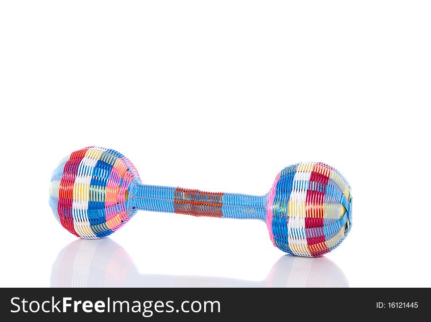 A plastic colorful rattle isolated over white